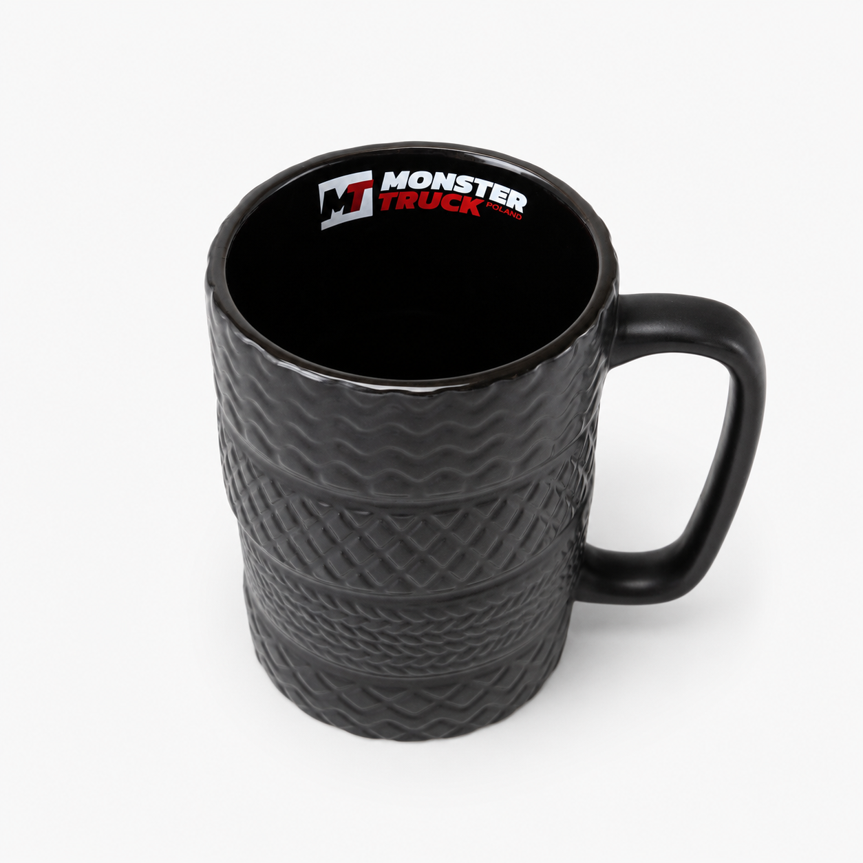 Wnętrze czarnego kubka Monster Truck Poland z logo – widok z góry